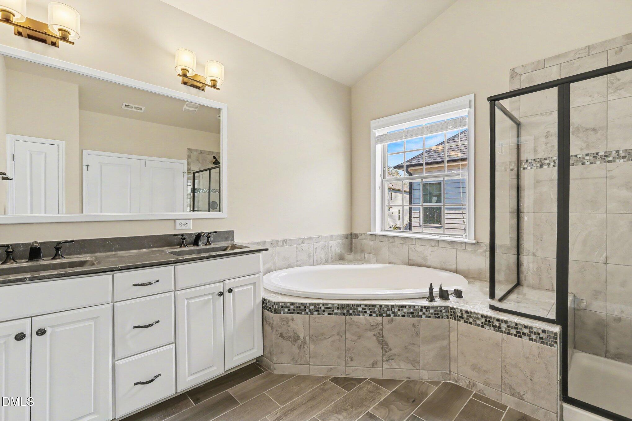 351 Gartrell Way Cary, NC 27519 - Photo 35 of 51 a bathroom with a granite countertop sink and a mirror