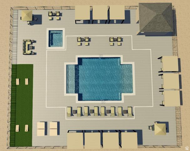 990 Manen Street Washington, UT 84780 - Photo 38 of 43 Expansive outdoor recreational area featuring a central swimming pool with integrated steps, a separate square spa, and an adjacent green lawn