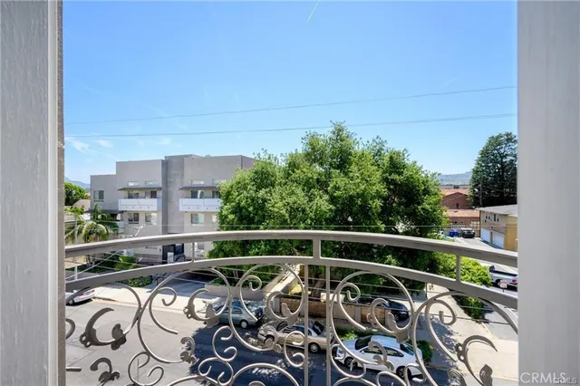 a view of balcony with furniture