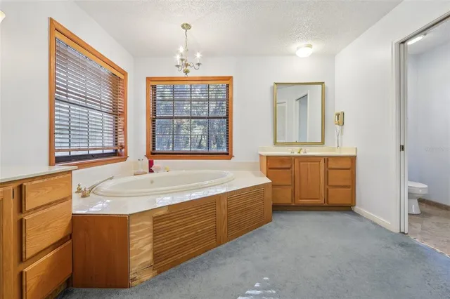 a bedroom with furniture and a couch