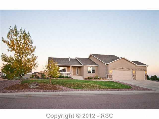 8739 Del Rio Road Peyton, CO 80831 - Photo 1 of 25 Immaculate Upgraded Stucco/Stone Rancher on ½ Acre Lot w/3 Car Garage