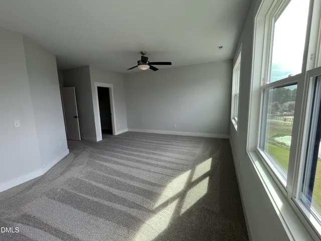 a bathroom with a sink a mirror and a shower