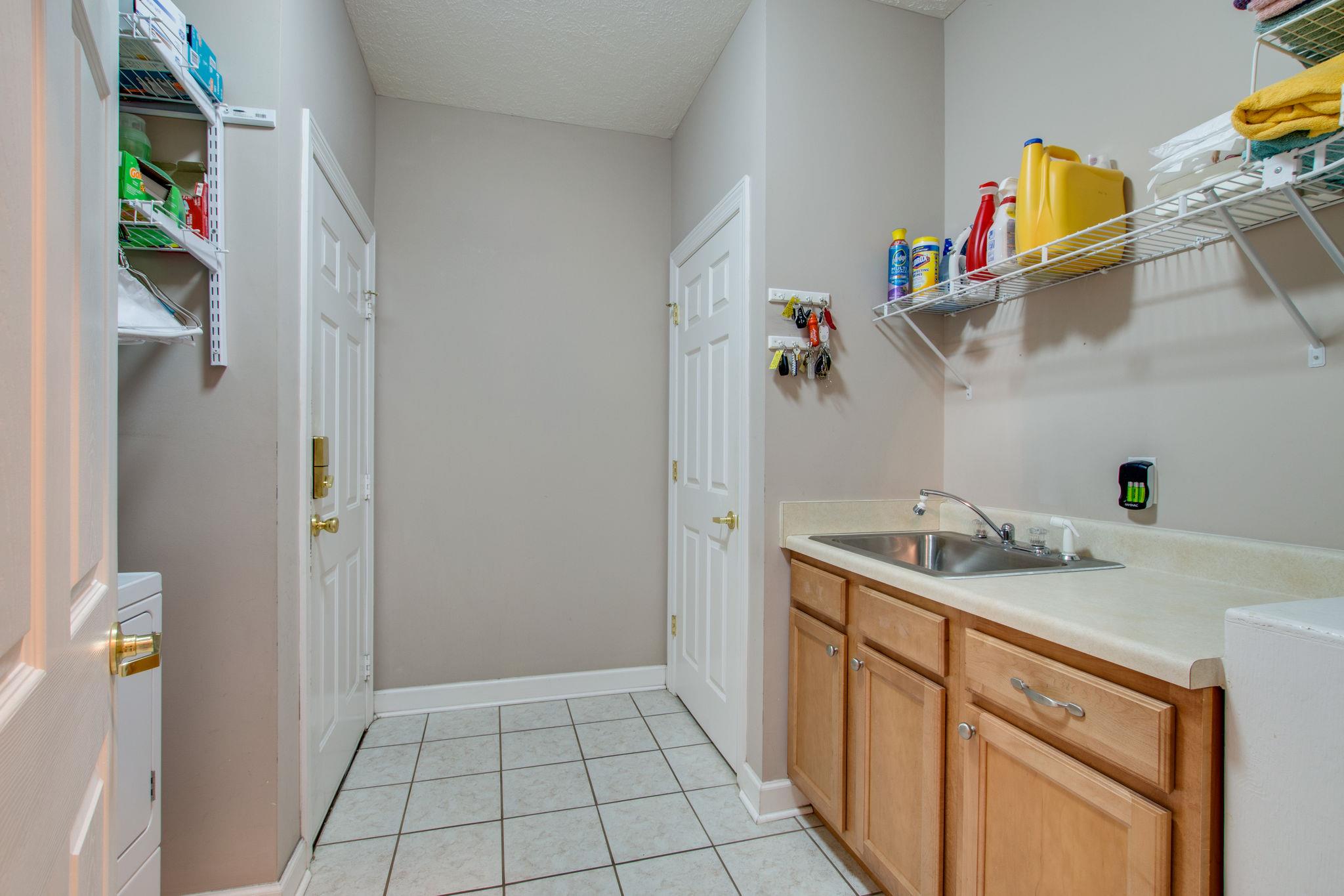 2681 Almaville Road Smyrna, TN 37167 - Photo 17 of 29 Laundry room with sink off garage.