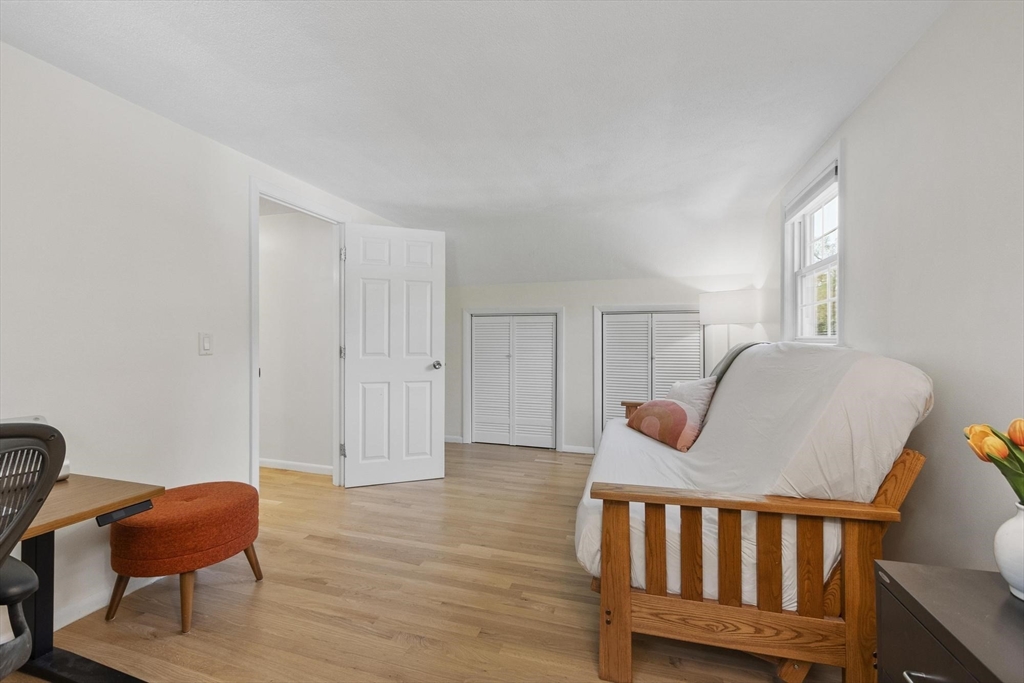 6 Edith Road Hudson, MA 01749 - Photo 21 of 30 a bedroom with furniture and wooden floor