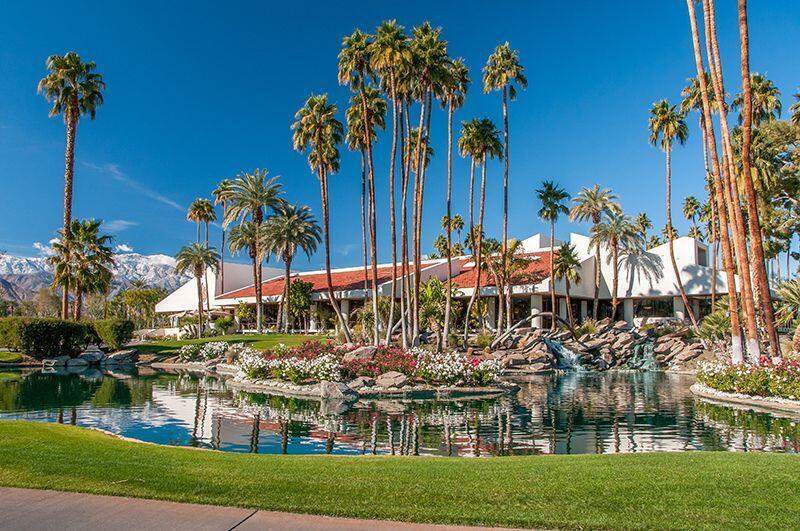72 Colgate Drive Rancho Mirage, CA 92270 - Photo 1 of 1 a view of a lake with a building in the background