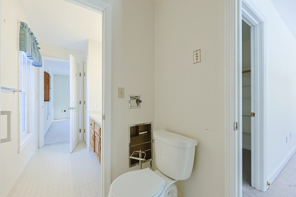 17 Quisset Brook Road, Unit 17 Milton, MA 02186 - Photo 13 of 40 a bathroom with a toilet and a shower