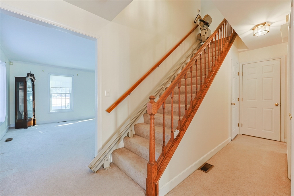 17 Quisset Brook Road, Unit 17 Milton, MA 02186 - Photo 22 of 40 a view of staircase with railing and stairs