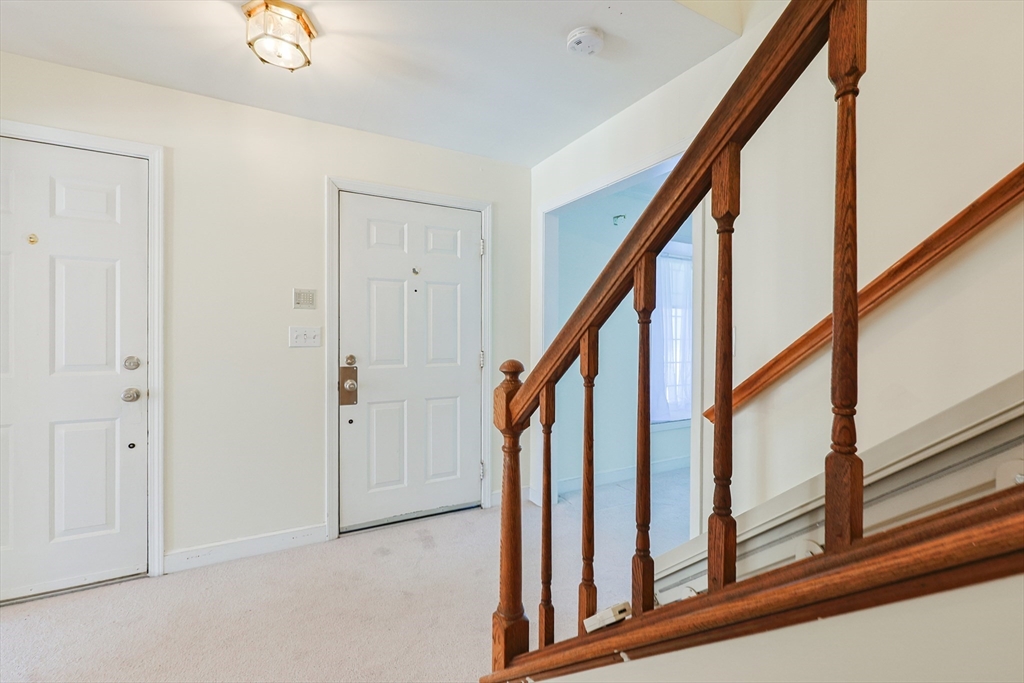 17 Quisset Brook Road, Unit 17 Milton, MA 02186 - Photo 23 of 40 a view of an entryway with staircase