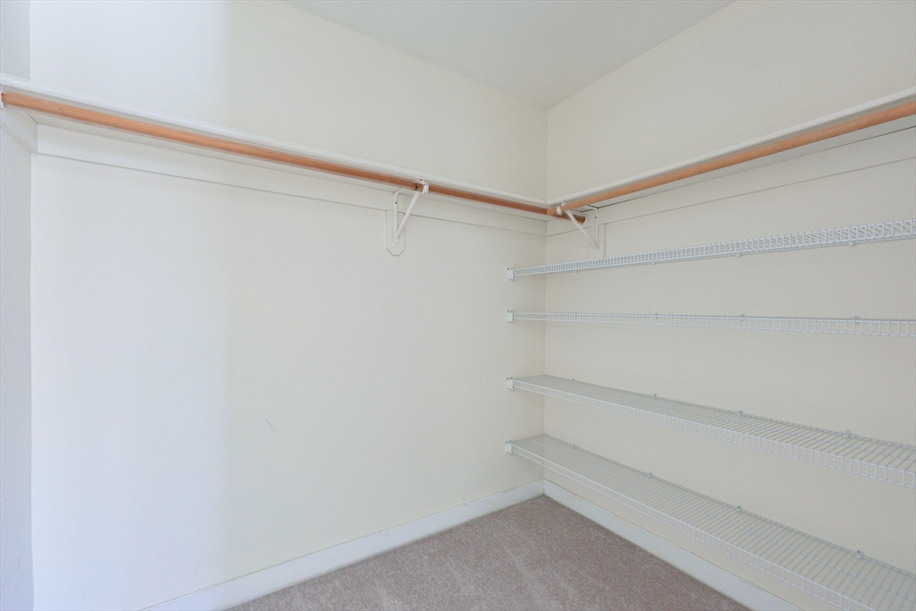 17 Quisset Brook Road, Unit 17 Milton, MA 02186 - Photo 30 of 40 a view of an empty walk in closet