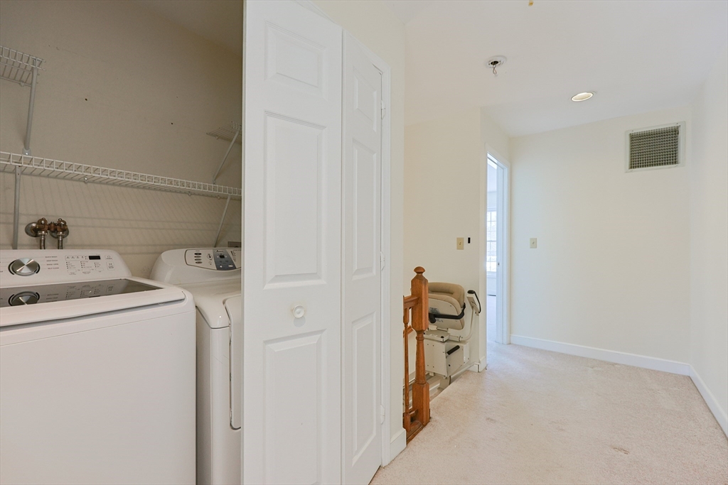 17 Quisset Brook Road, Unit 17 Milton, MA 02186 - Photo 34 of 40 a view of storage and utility room with washer and dryer