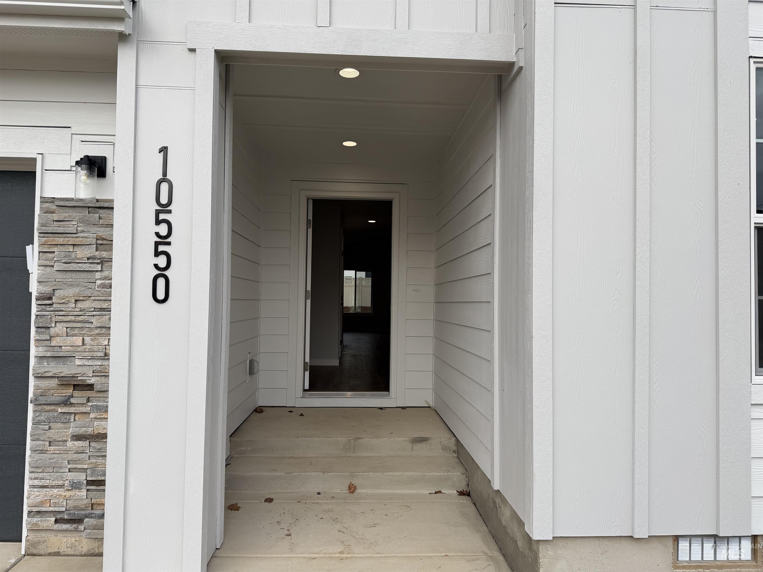 10550 West Tinder Street Star, ID 83669 - Photo 3 of 18 Doorway to property with stone siding