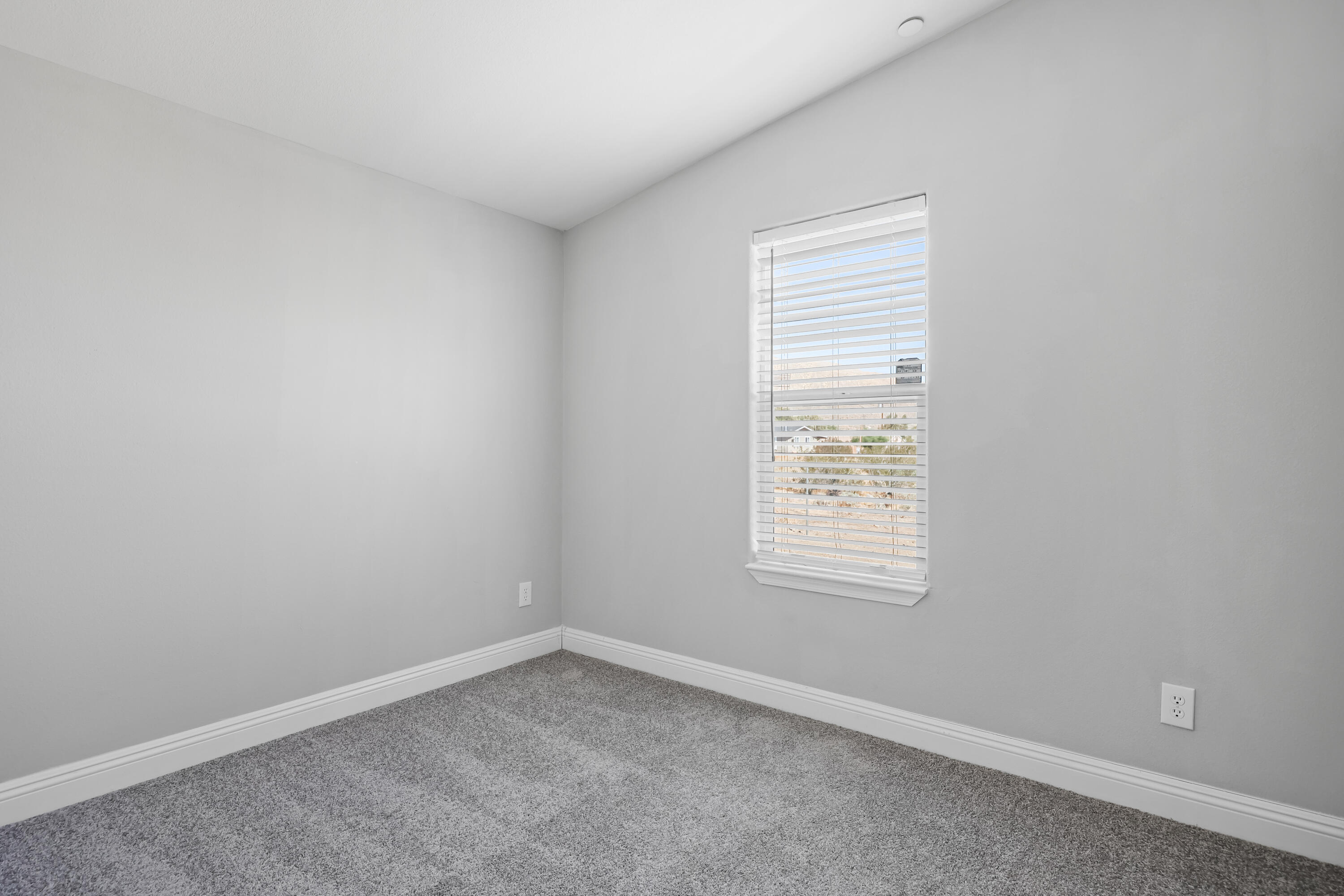 13446 Cholla Road Whitewater, CA 92282 - Photo 12 of 30 an empty room with a window