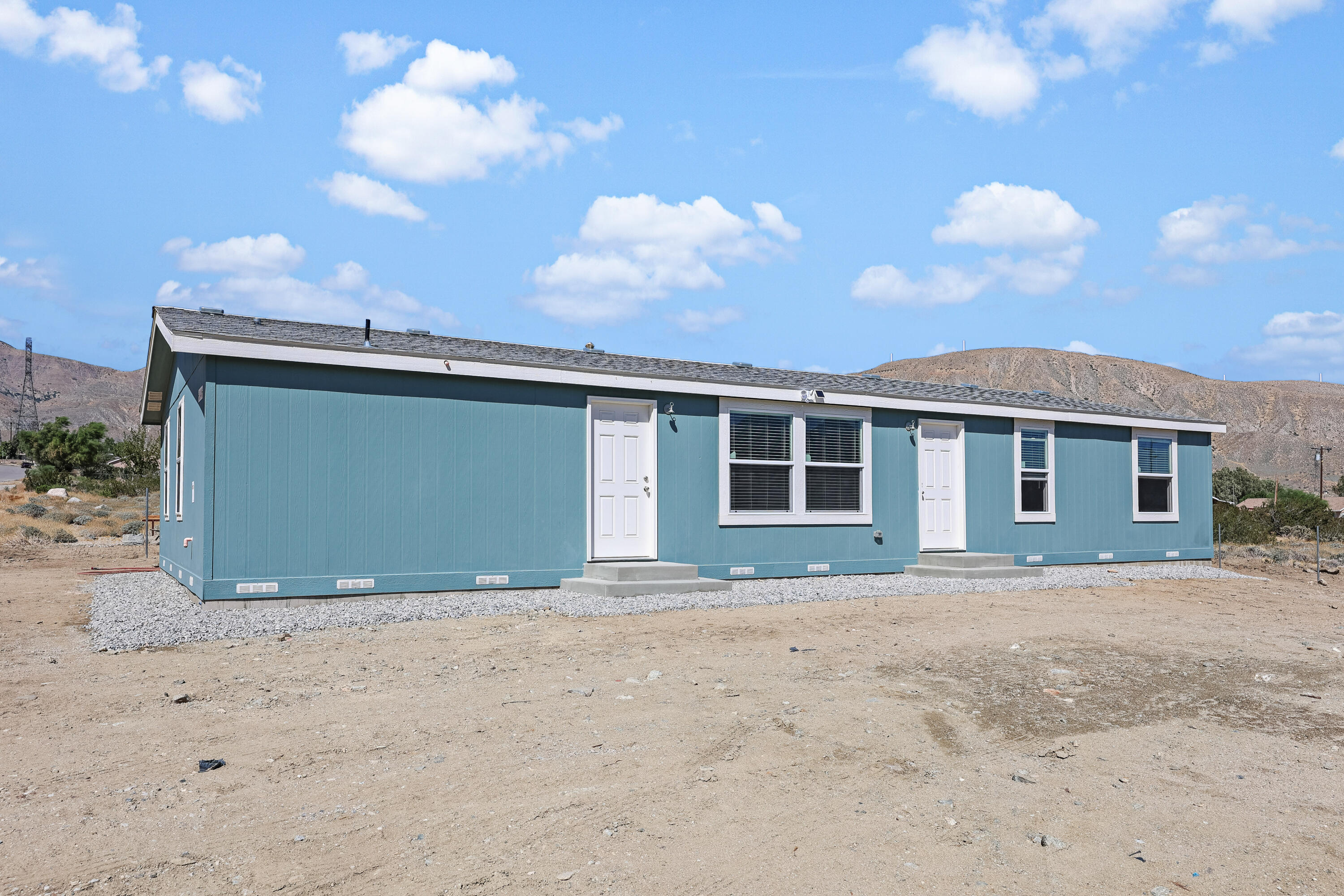13446 Cholla Road Whitewater, CA 92282 - Photo 18 of 30 a front view of a house with a yard