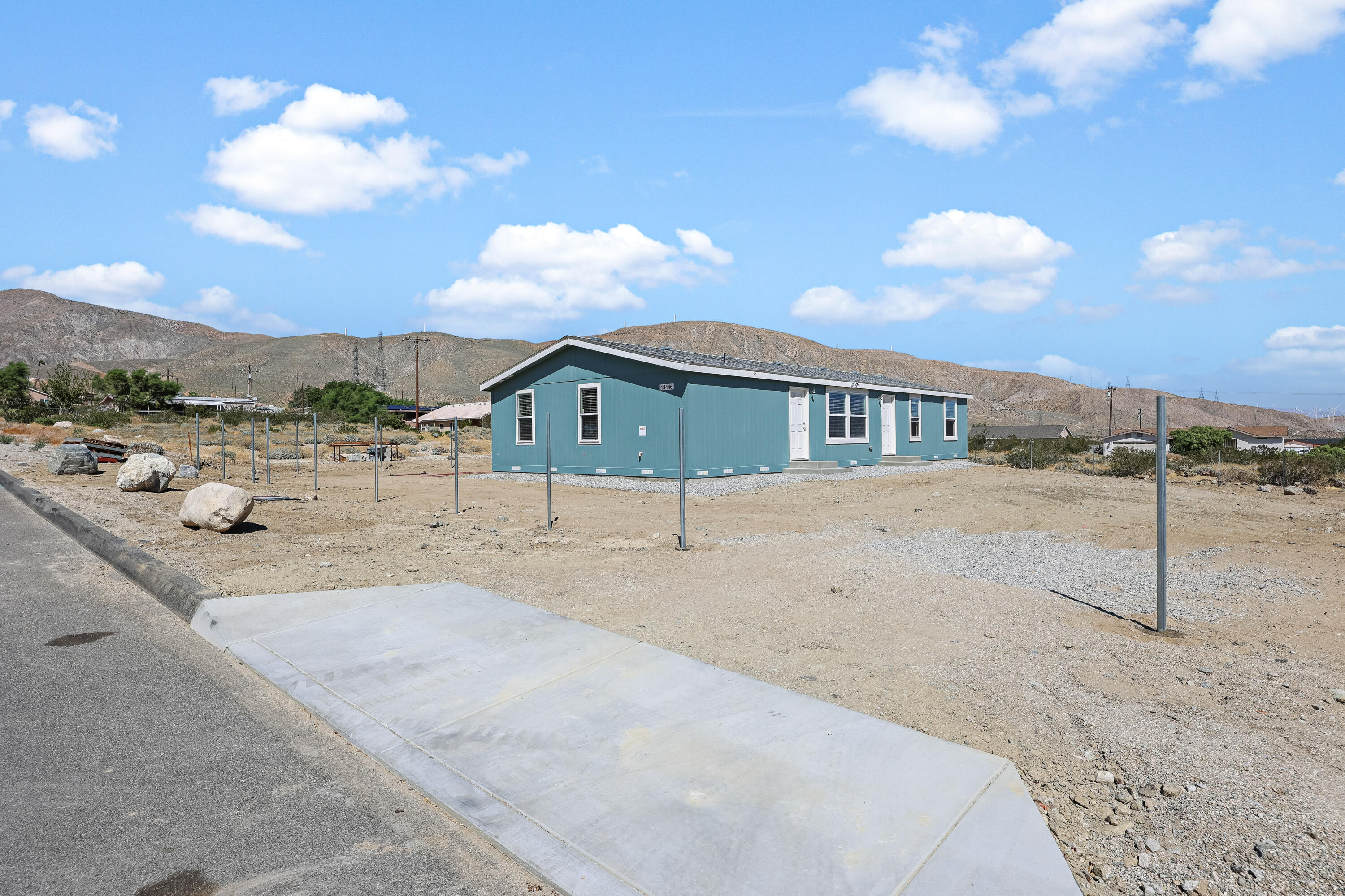 13446 Cholla Road Whitewater, CA 92282 - Photo 21 of 30 a view of a house with a backyard
