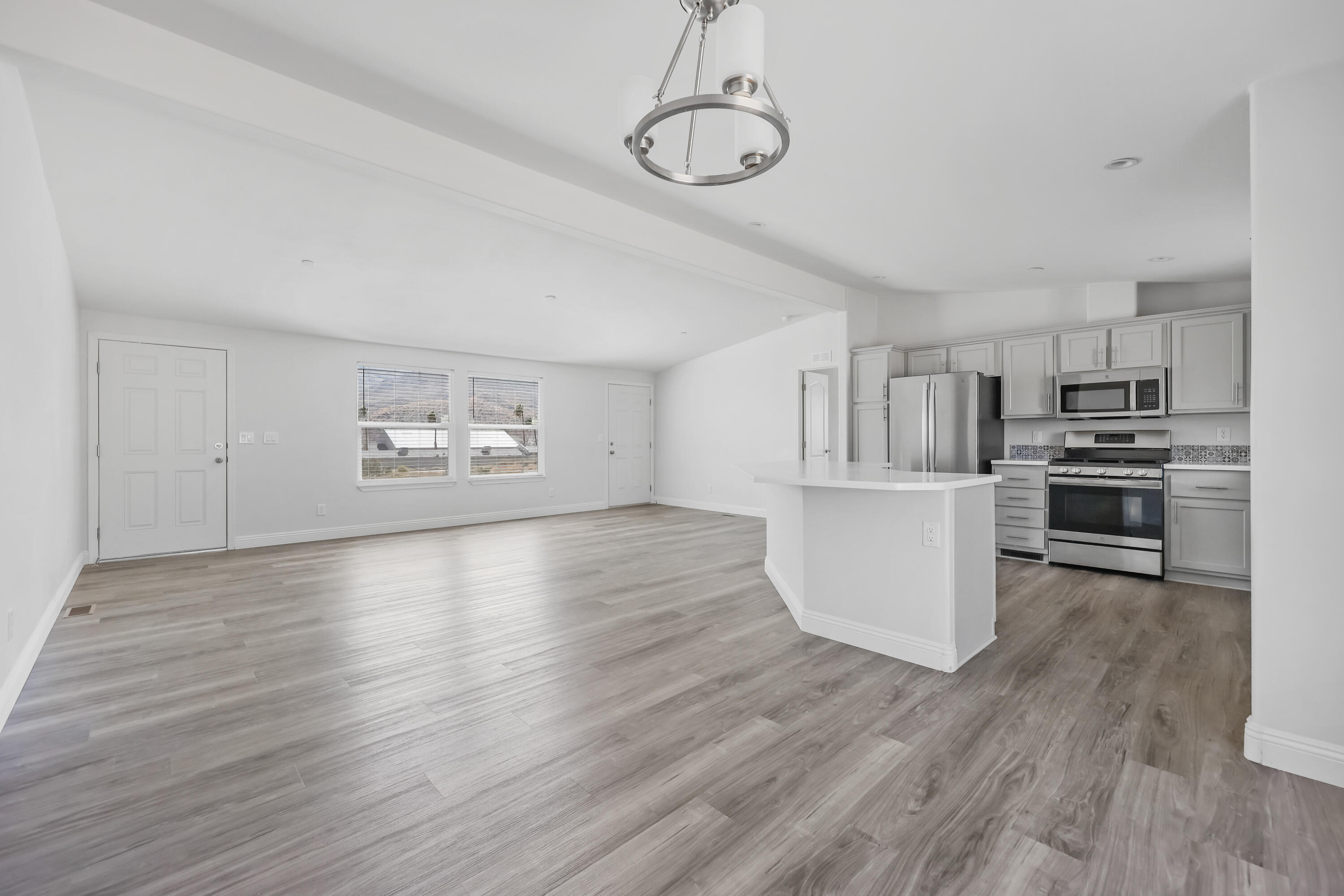 13446 Cholla Road Whitewater, CA 92282 - Photo 5 of 30 a view of kitchen with furniture wooden floor and window
