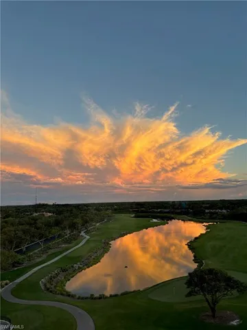 a view of swimming pool from a yard