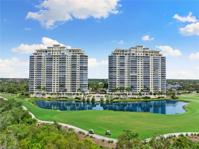 a view of a building with a yard