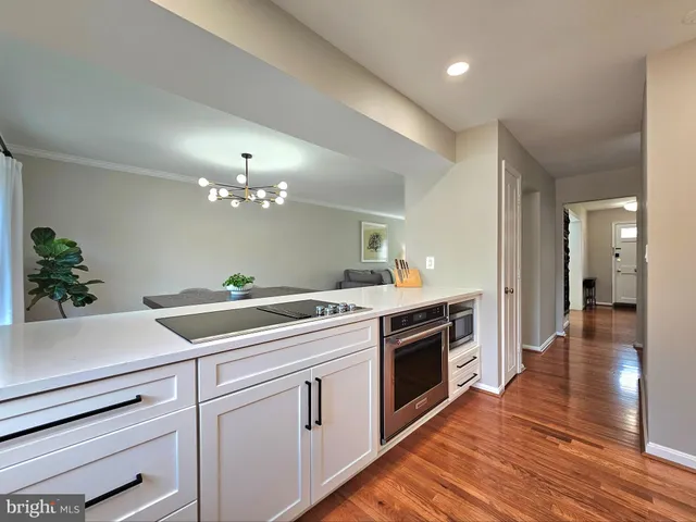 a kitchen with a sink and stove