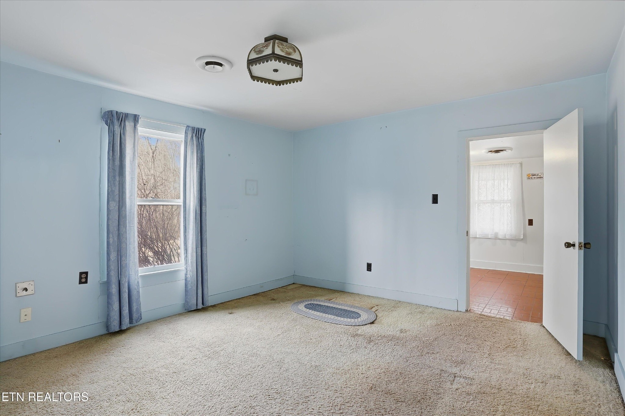 7809 Wood Road Corryton, TN 37721 - Photo 12 of 51 a view of an empty room with a window