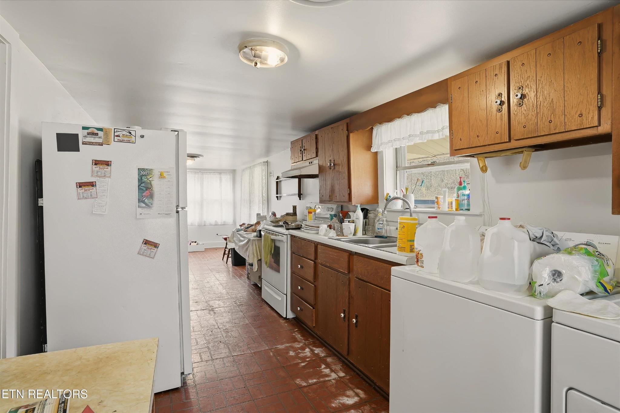 7809 Wood Road Corryton, TN 37721 - Photo 17 of 49 a view of utility room and washer and dryer