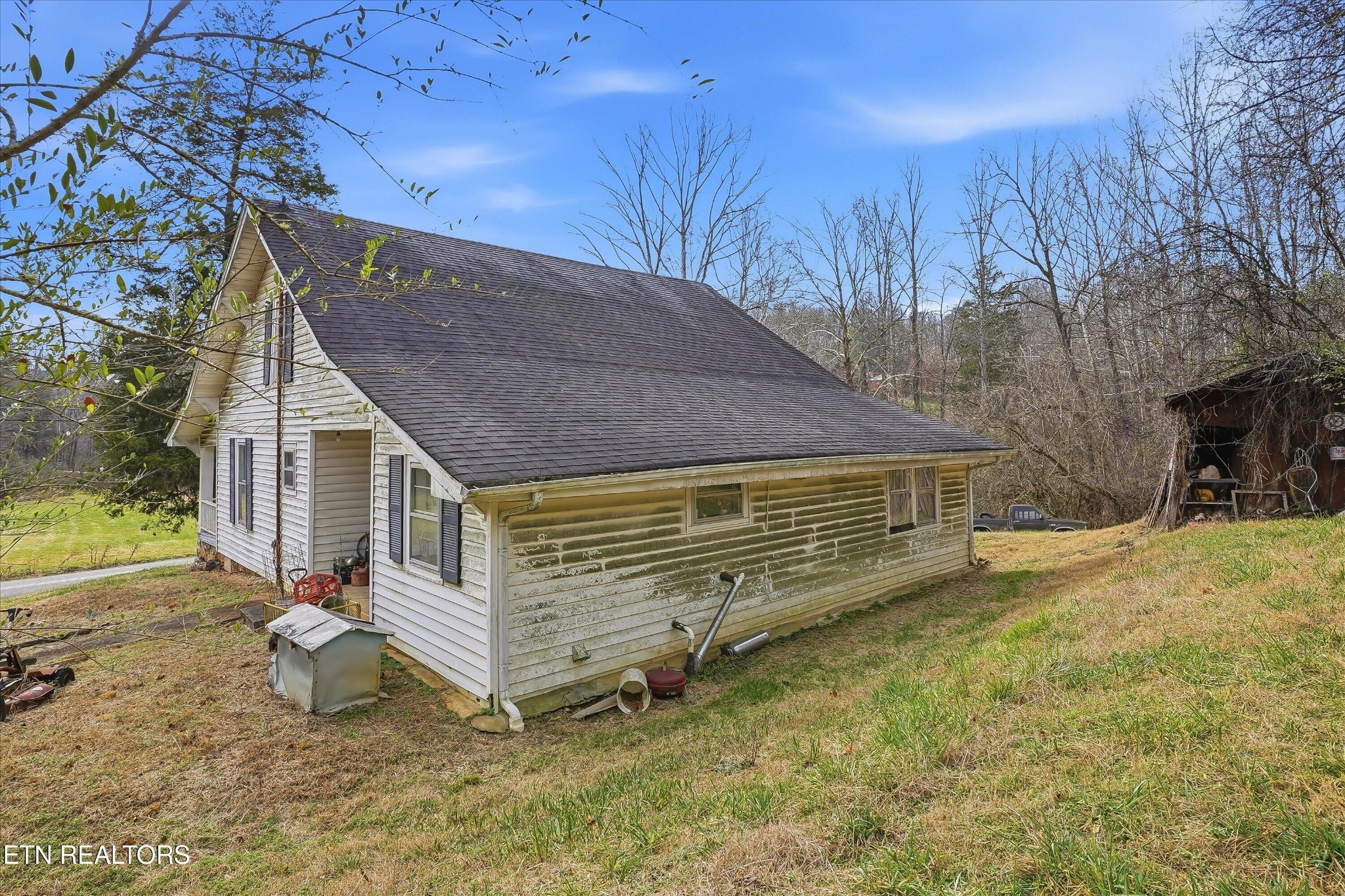 7809 Wood Road Corryton, TN 37721 - Photo 24 of 49 a view of a house with a yard