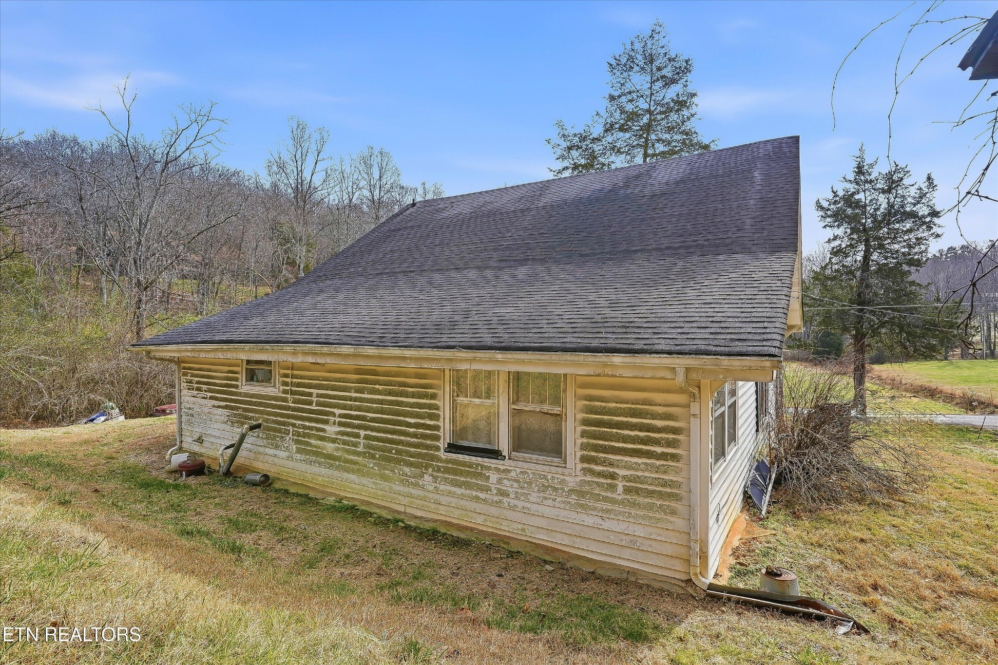 7809 Wood Road Corryton, TN 37721 - Photo 25 of 49 a view of a house with a yard