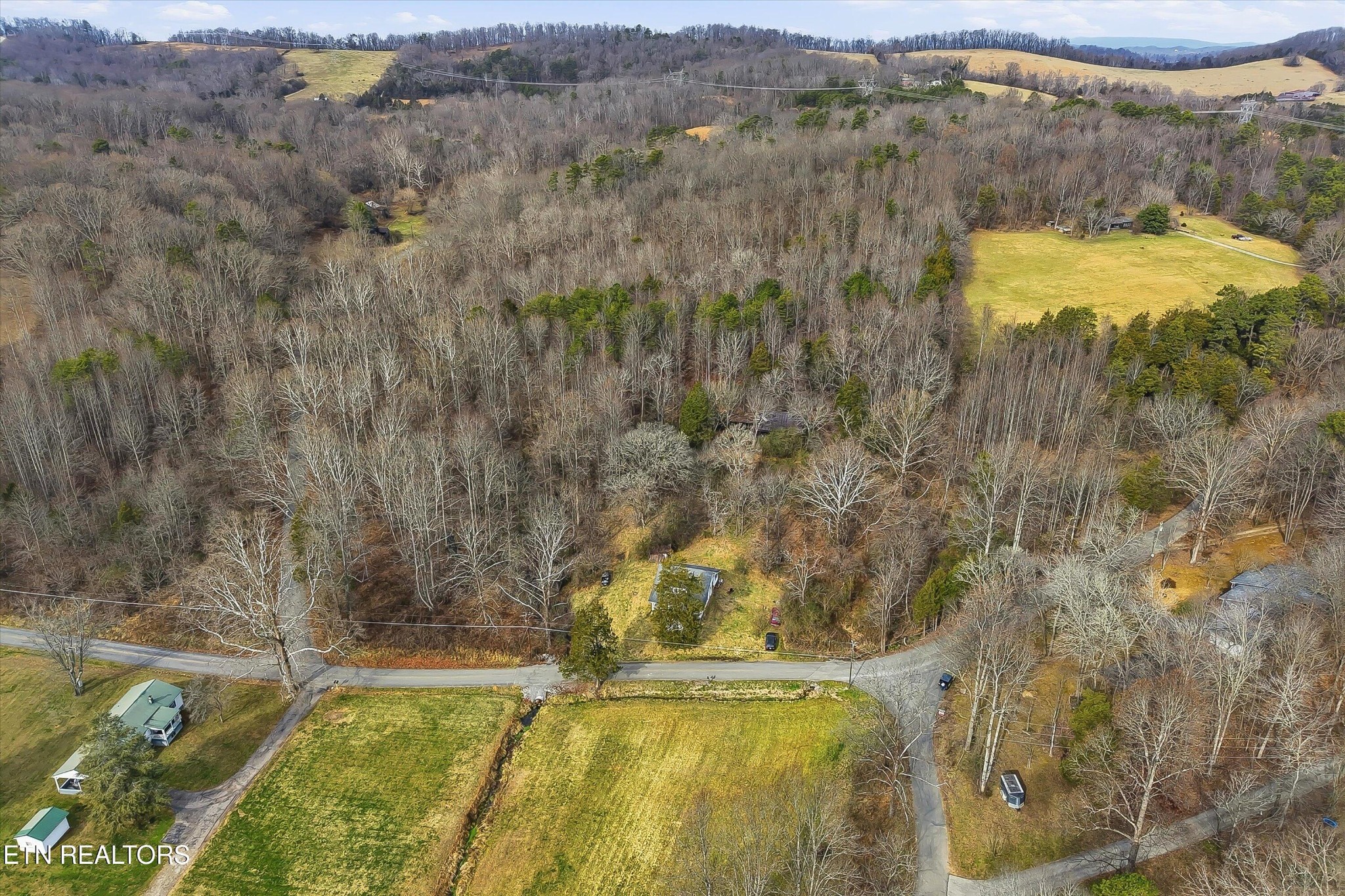 7809 Wood Road Corryton, TN 37721 - Photo 27 of 49 a view of a swimming pool with a yard