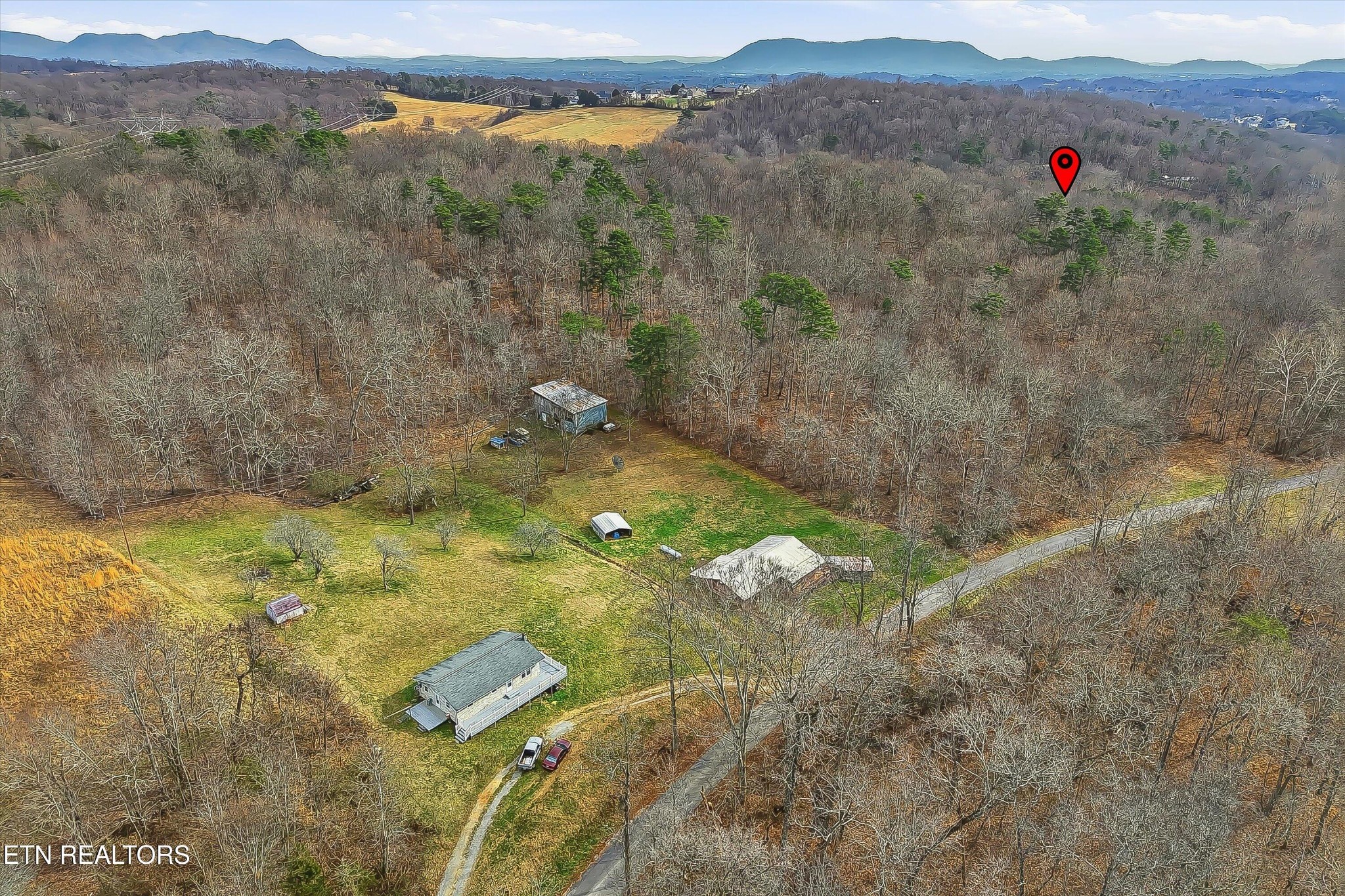 7809 Wood Road Corryton, TN 37721 - Photo 30 of 49 a view of a lush green hillside and houses