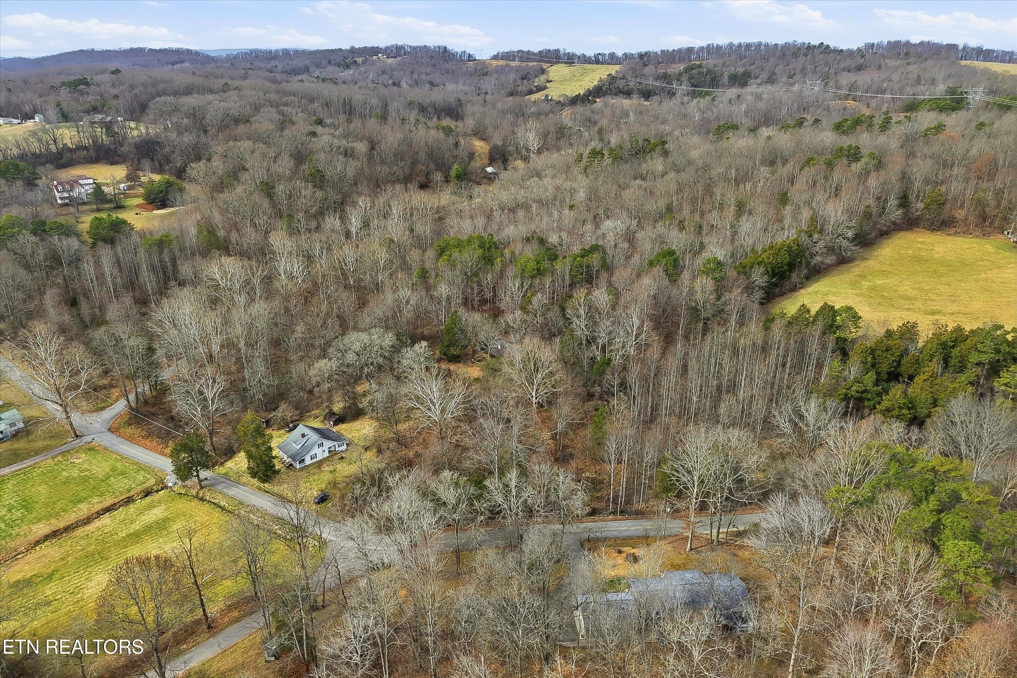 7809 Wood Road Corryton, TN 37721 - Photo 51 of 51 a view of a town with mountains in the background