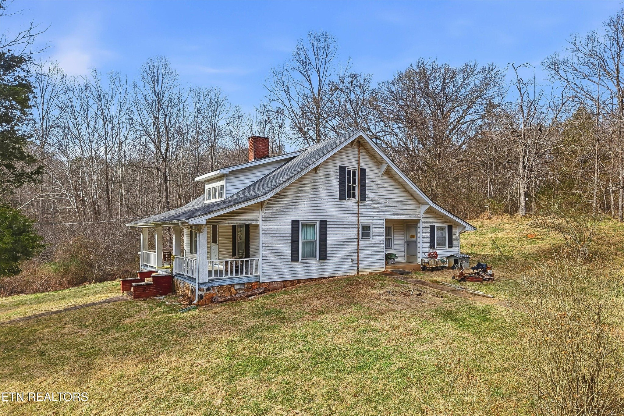 7809 Wood Road Corryton, TN 37721 - Photo 7 of 49 a view of a house with a yard