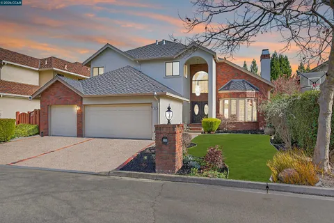 front view of a house with a small yard