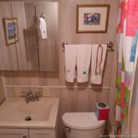 a bathroom with a sink and toilet