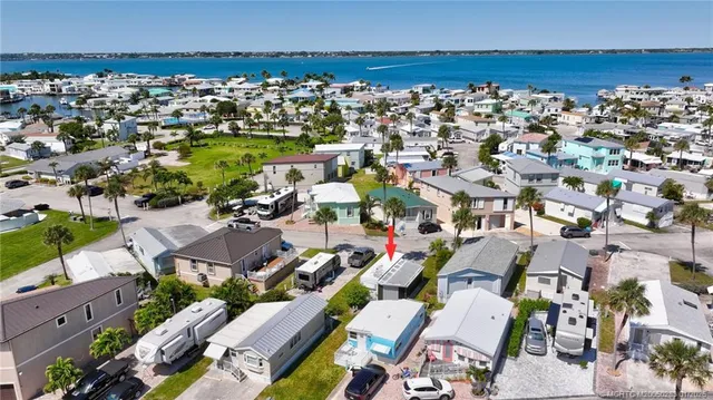 an aerial view of a houses with outdoor space