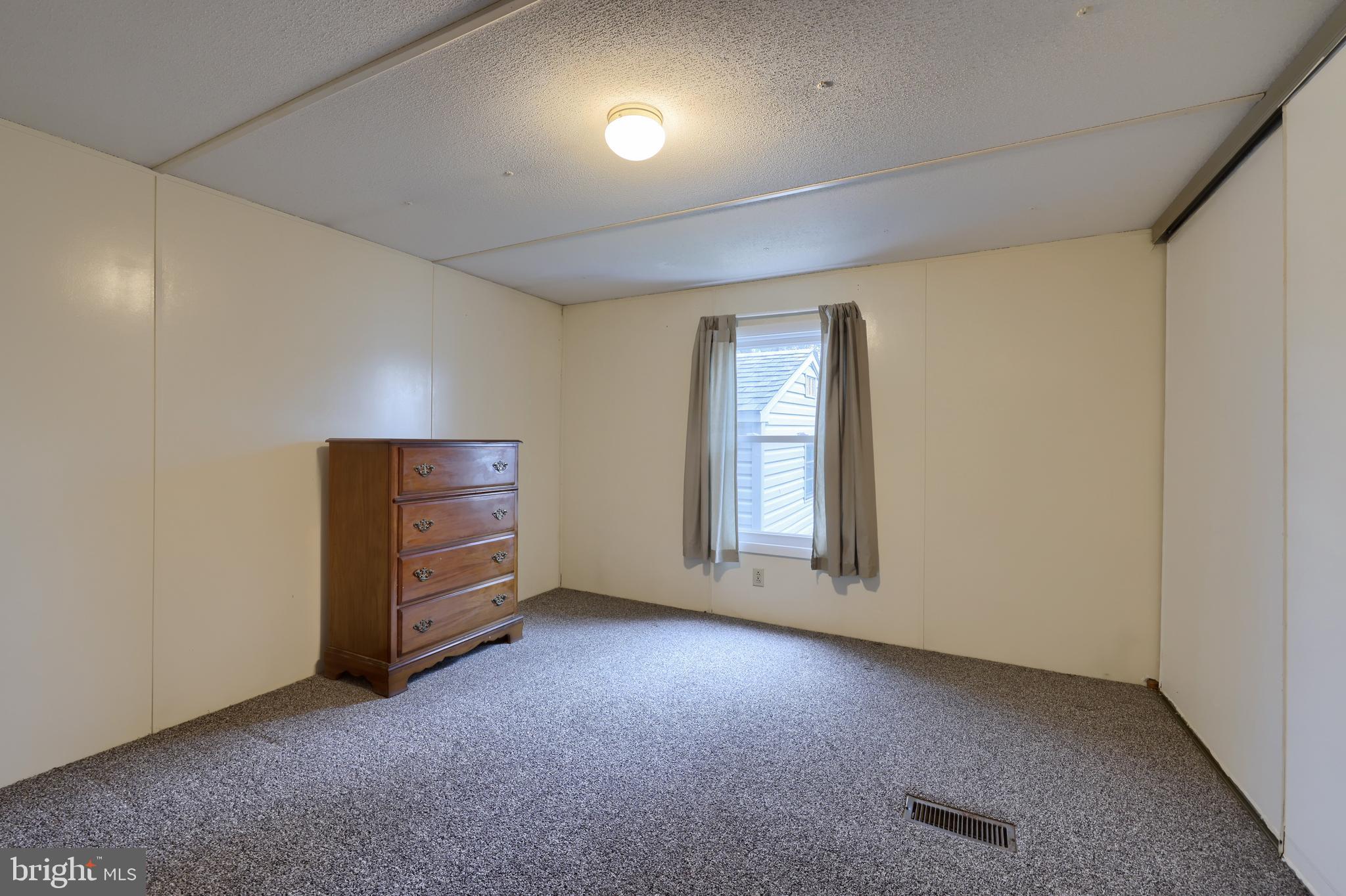 123 Ridgewood Manor Manheim, PA 17545 - Photo 18 of 25 an empty room with windows and closet