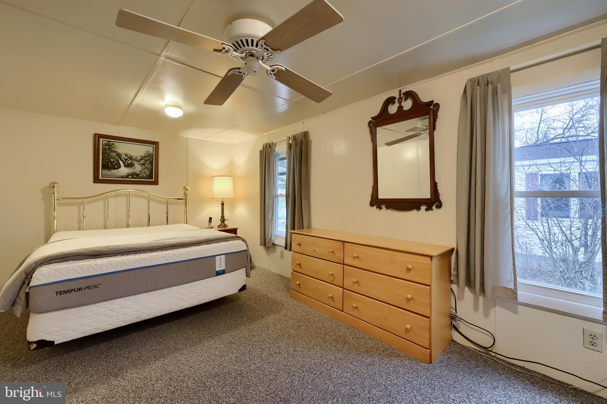 123 Ridgewood Manor Manheim, PA 17545 - Photo 20 of 25 a spacious bedroom with a bed and a window