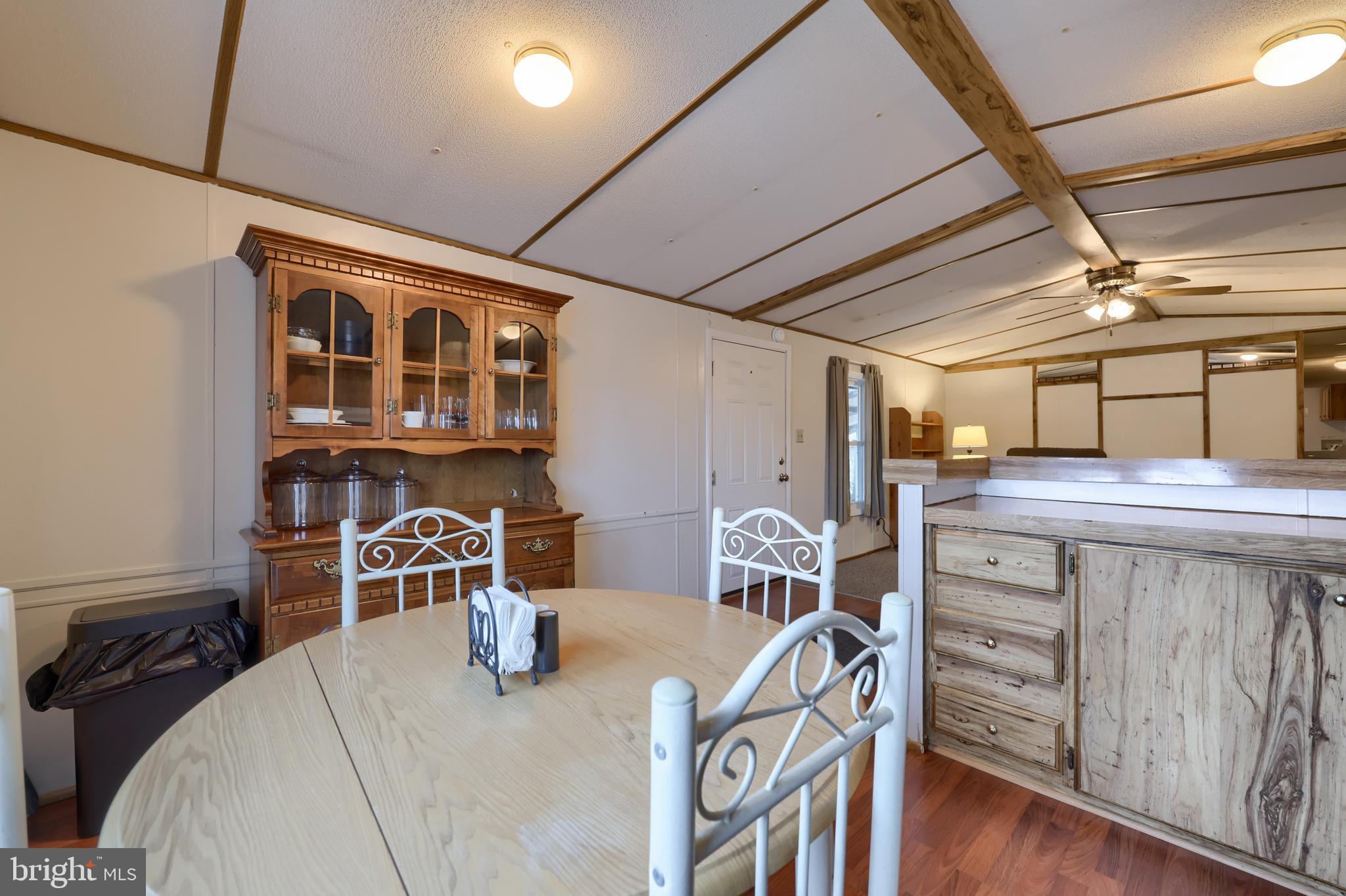123 Ridgewood Manor Manheim, PA 17545 - Photo 10 of 25 a view of a dining room with furniture window and wooden floor