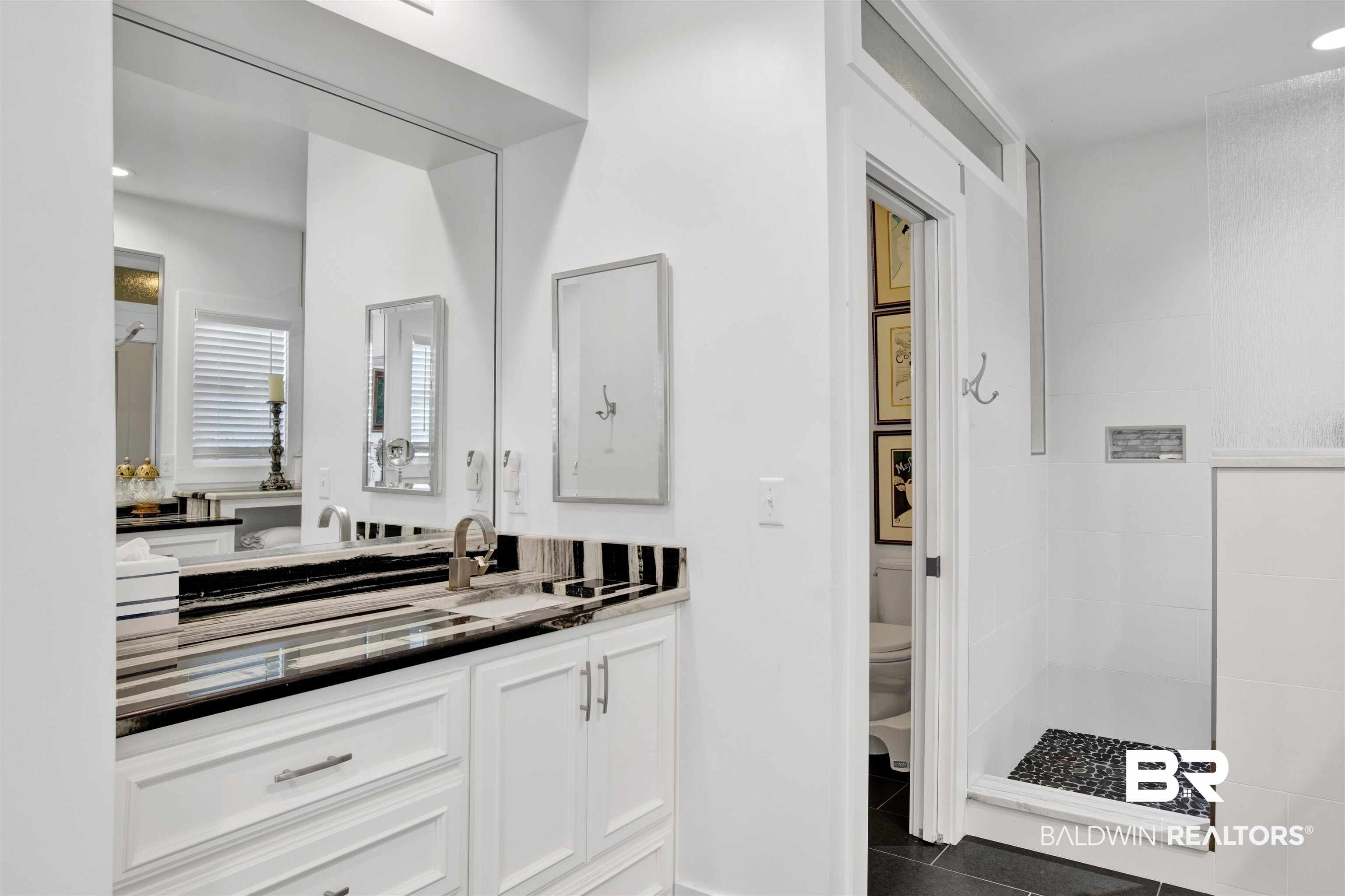 30538 River Road Orange Beach, AL 36561 - Photo 52 of 78 Bathroom featuring a walk in shower, vanity, and tile patterned floors