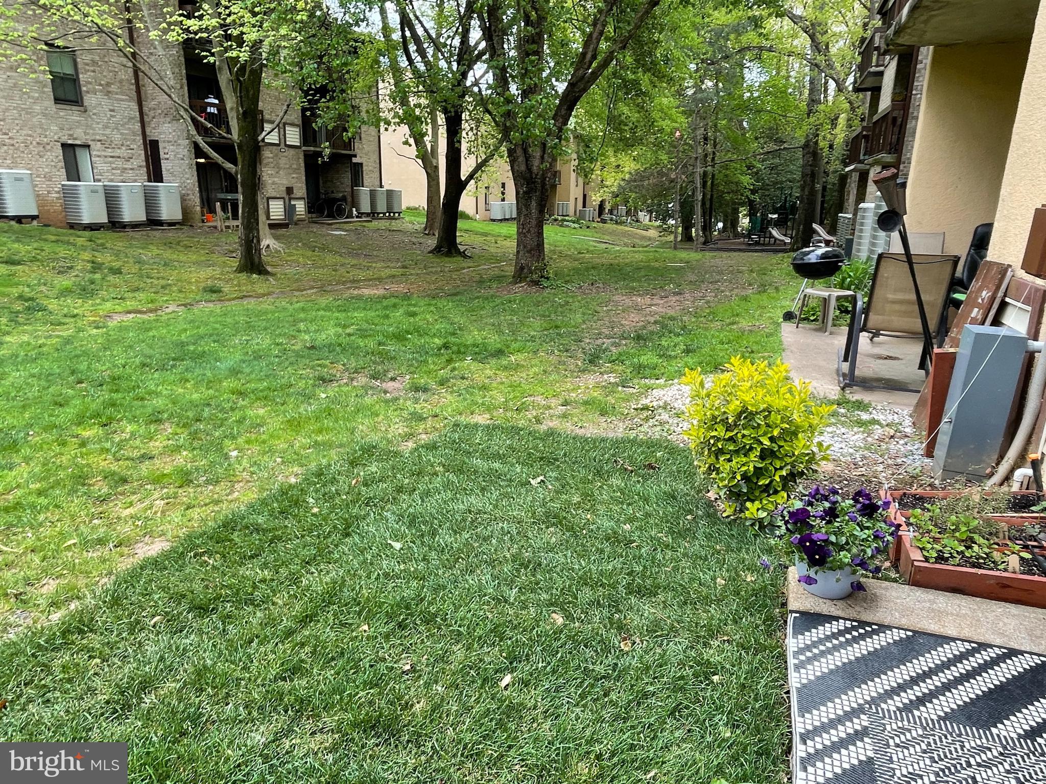2228 Castle Rock Square, Unit 1B Reston, VA 20191 - Photo 20 of 21 Green common space & Tot-Lot visible from patio