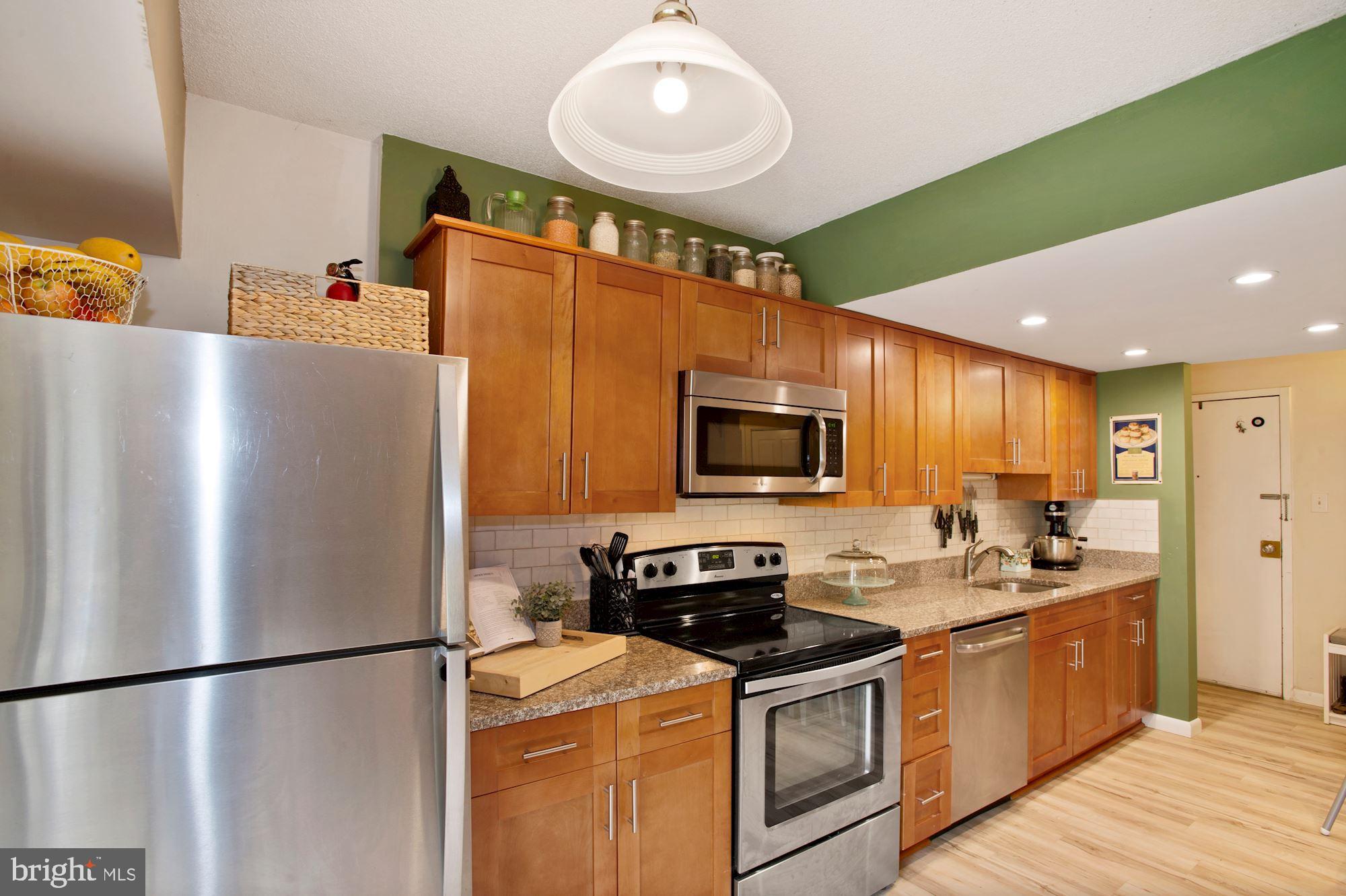 Granite counter& imported hand glazed tile backspl