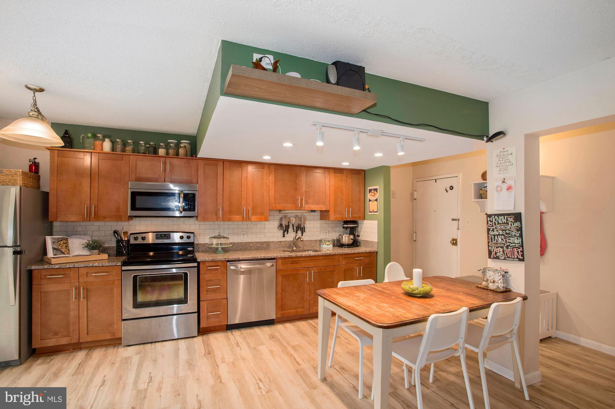 Updated bright & modern Luxury Vinyl throughout