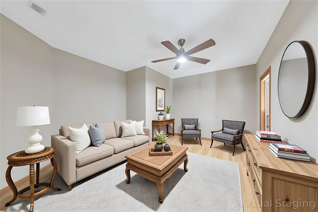 5940 Old Stilesboro Road Northwest Acworth, GA 30101 - Photo 14 of 61 a living room with furniture a rug and a chandelier