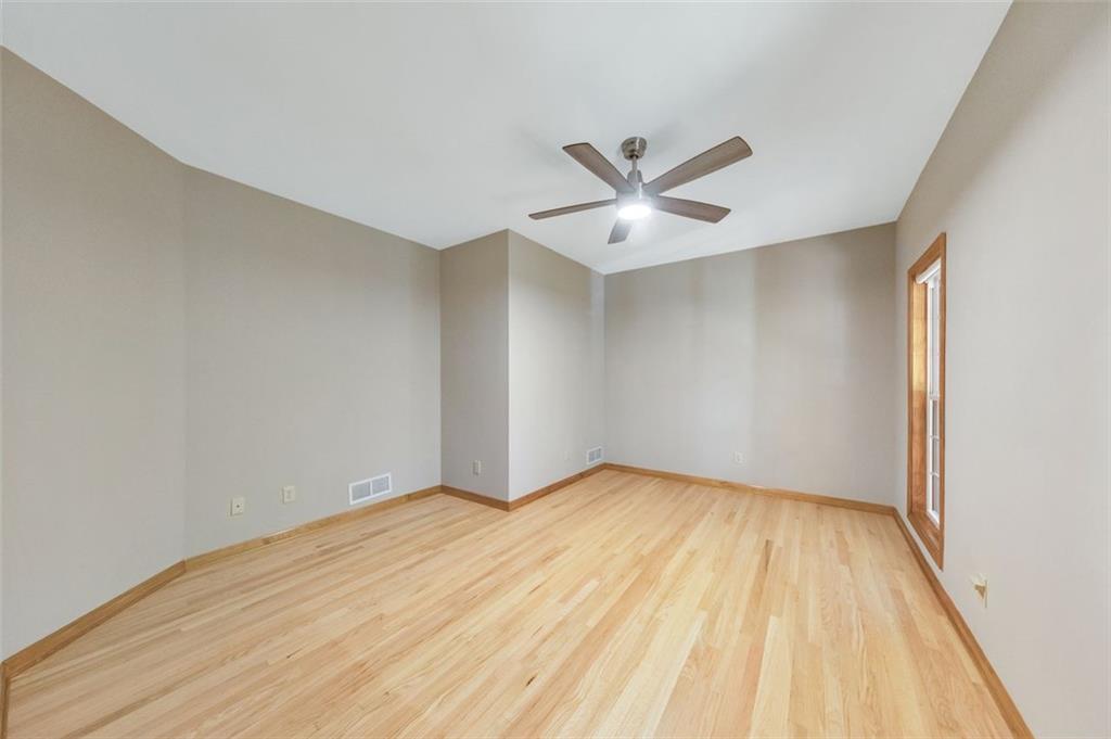 5940 Old Stilesboro Road Northwest Acworth, GA 30101 - Photo 16 of 61 a view of a big room with wooden floor and a ceiling fan