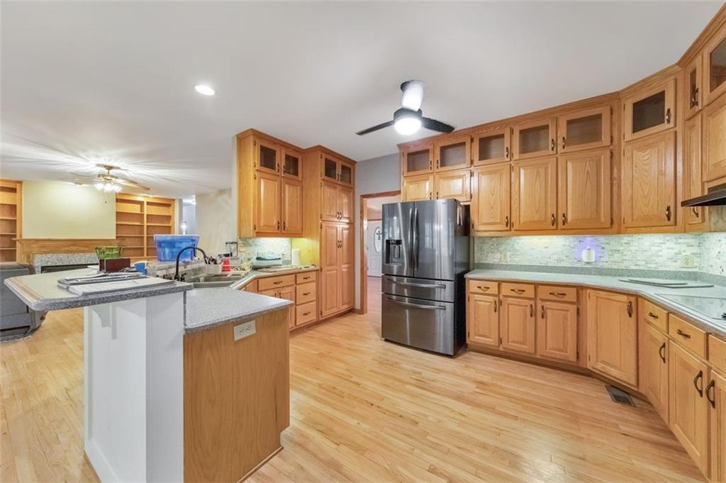 5940 Old Stilesboro Road Northwest Acworth, GA 30101 - Photo 22 of 61 a kitchen with refrigerator and cabinets