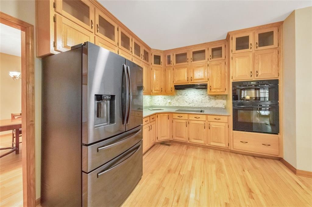5940 Old Stilesboro Road Northwest Acworth, GA 30101 - Photo 23 of 61 a kitchen with granite countertop a refrigerator and microwave