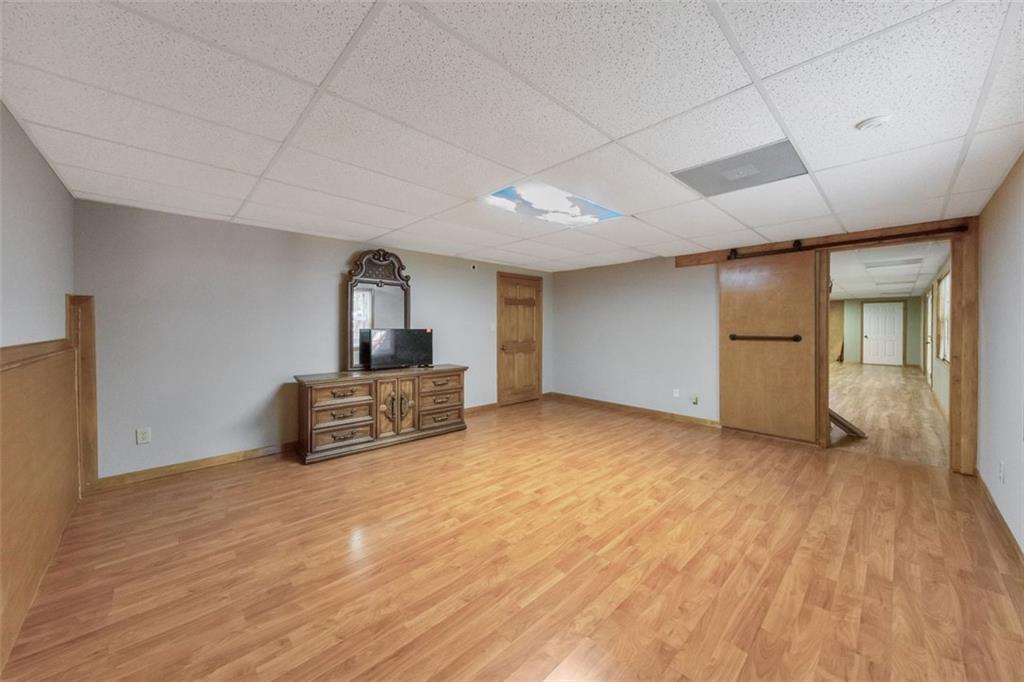 5940 Old Stilesboro Road Northwest Acworth, GA 30101 - Photo 43 of 61 a living room with furniture and a wooden floor