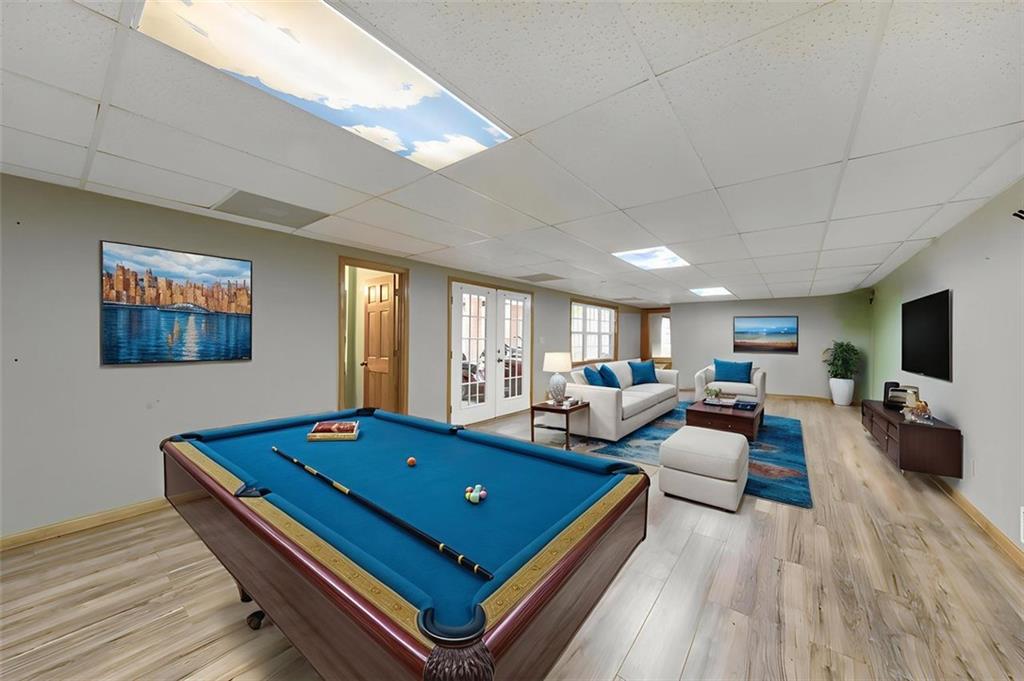 5940 Old Stilesboro Road Northwest Acworth, GA 30101 - Photo 7 of 61 a living room with furniture pool table and a wooden floor