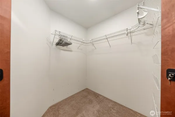 a view of a room with racks on the wall