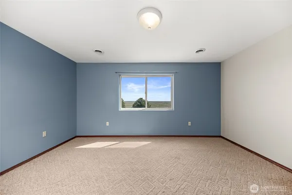 an empty room with a window