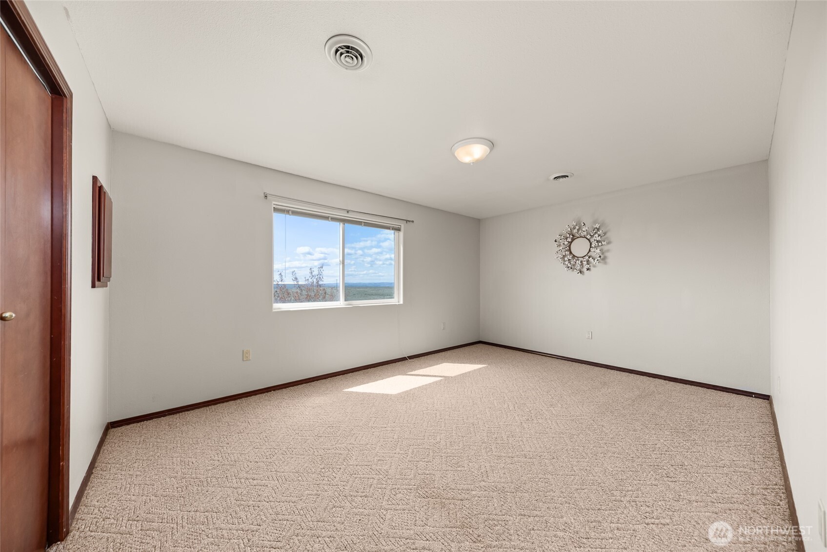 37761 L-NE Road Hartline, WA 99135 - Photo 27 of 40 an empty room with a empty space and windows