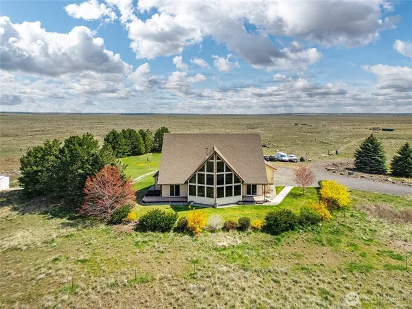 a view of a lake with a house